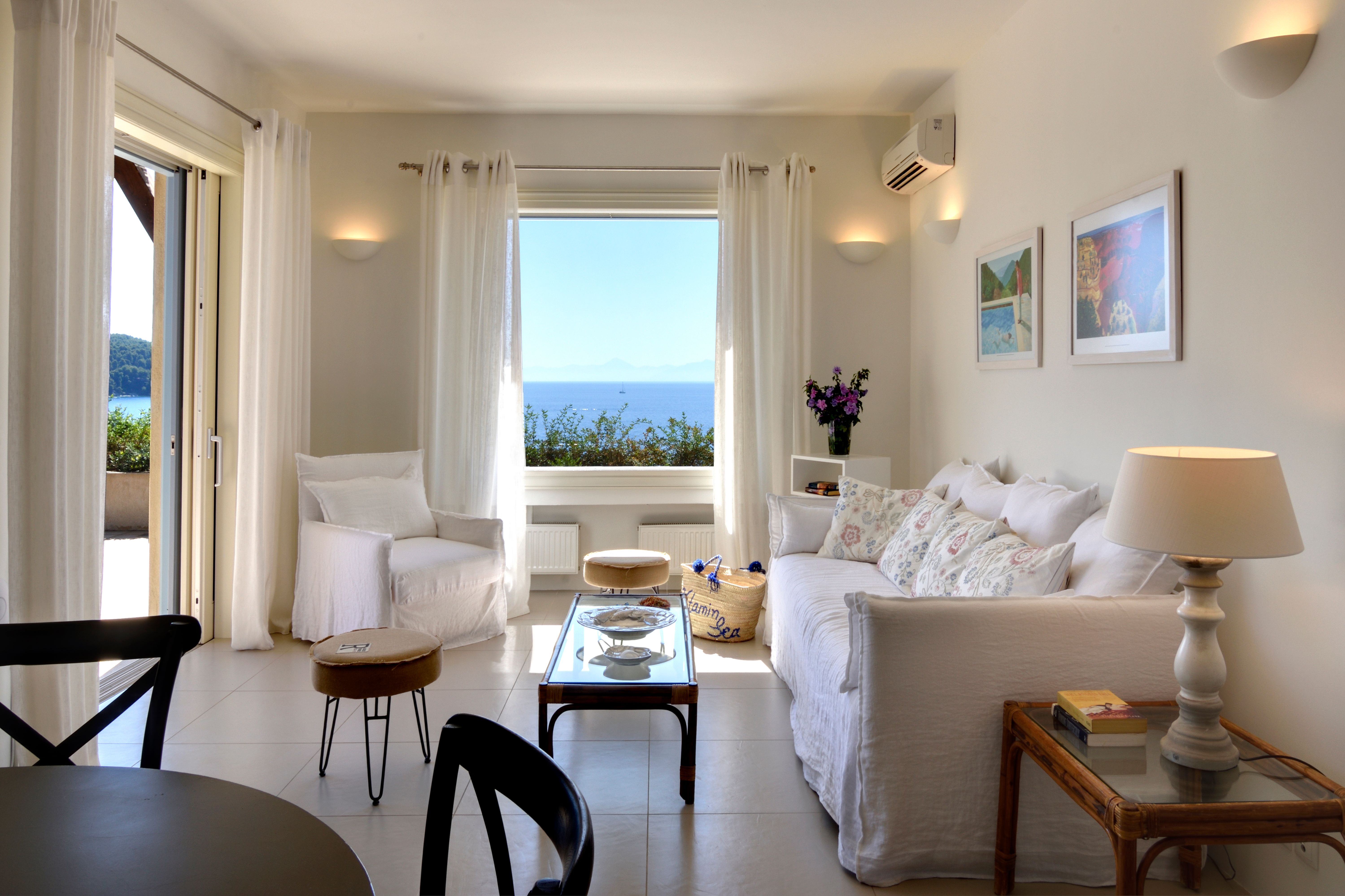 The living room with a window onto the sea