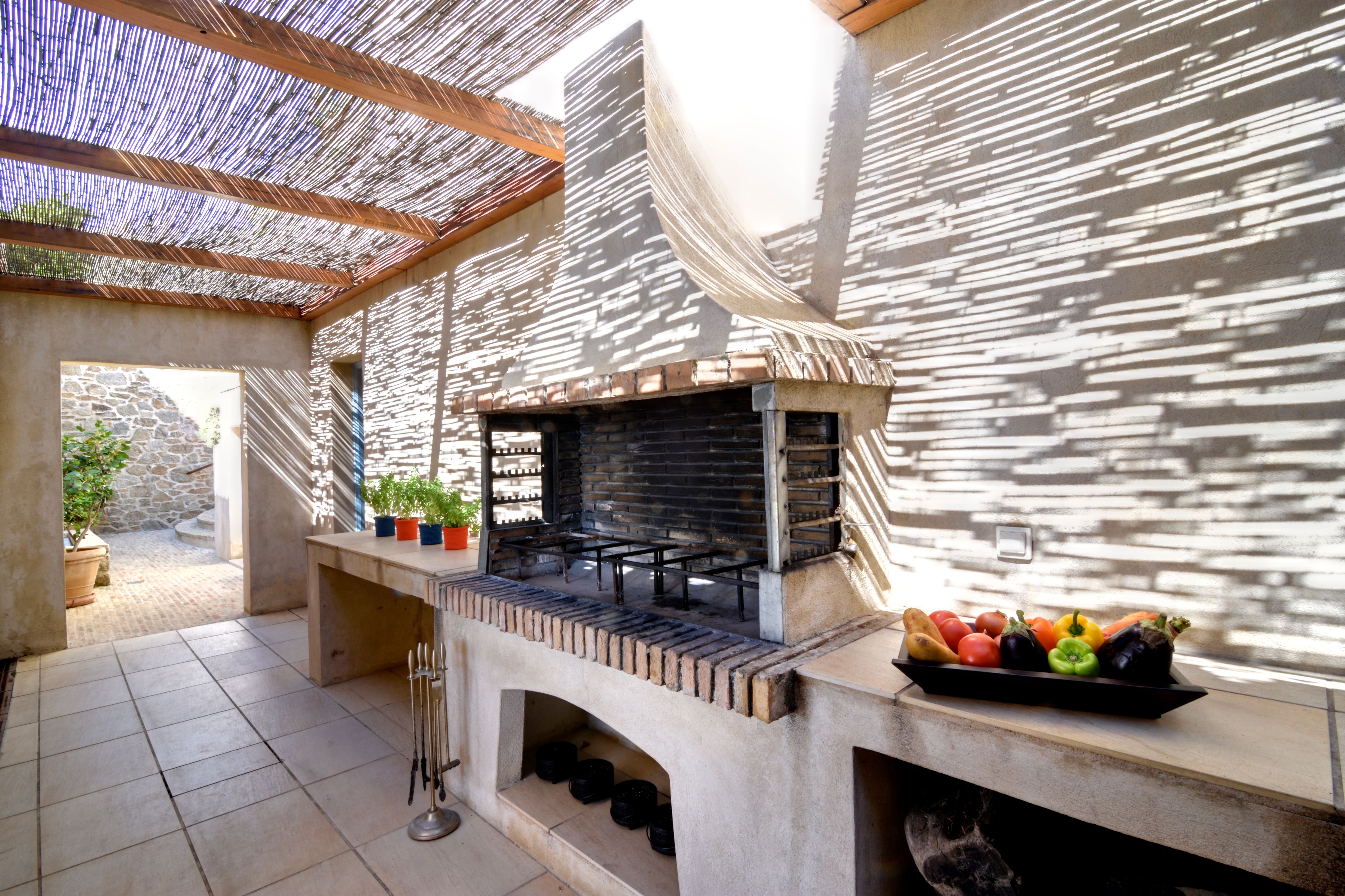 The barbecue under the pergola