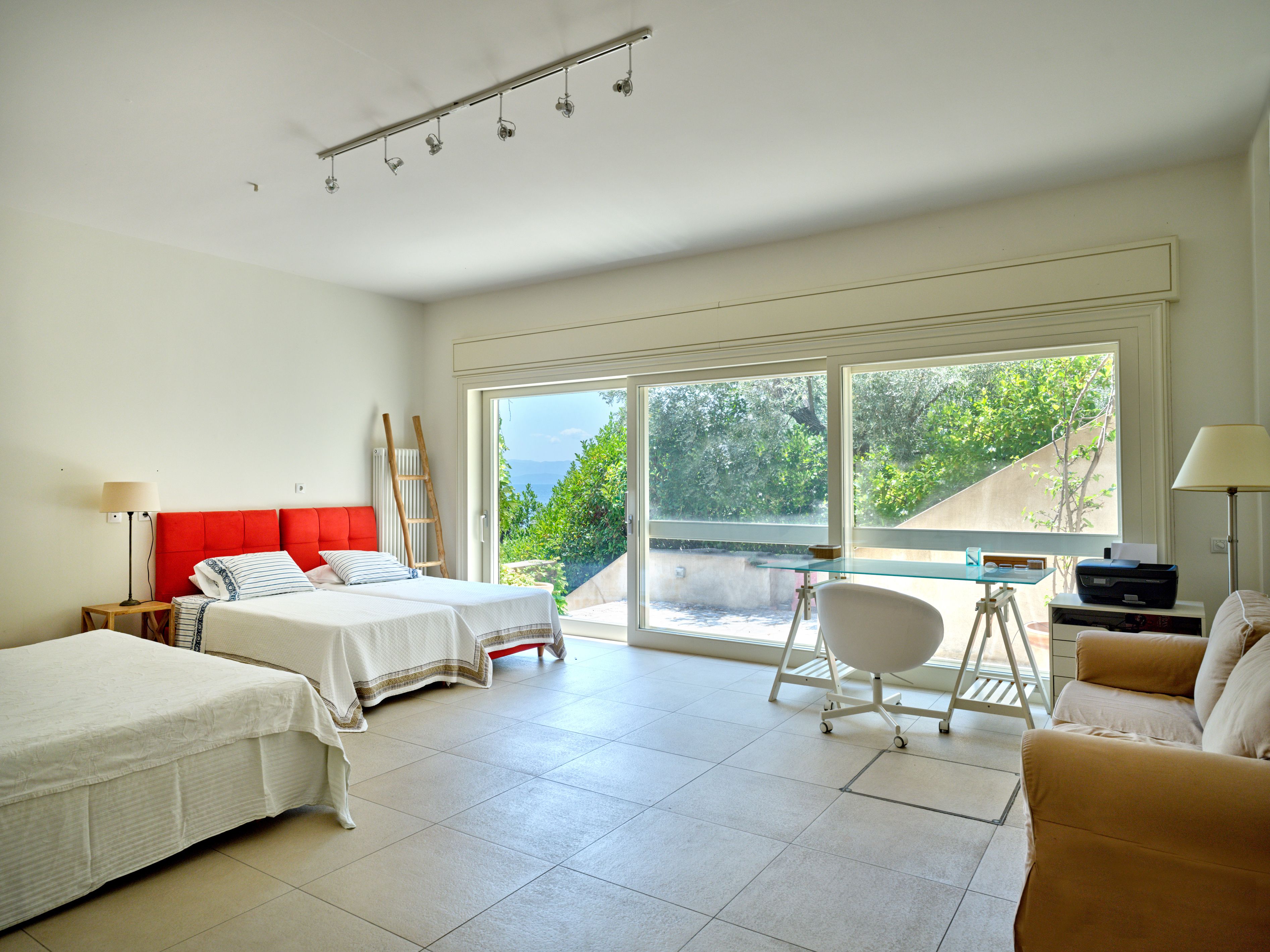 The multi-purpose bedroom on the pool level